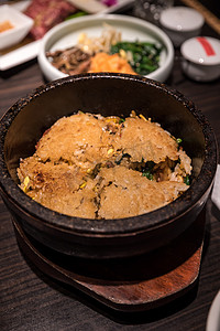 米饭拌饭料摄影照片_石锅拌饭石锅