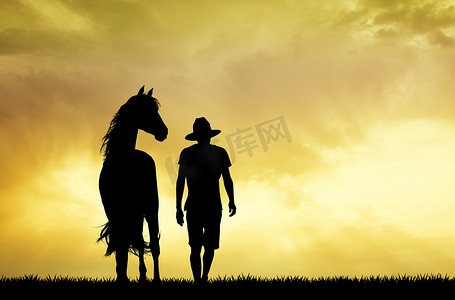 夕阳下的人与马
