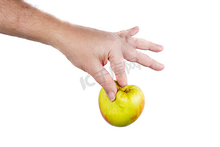 新鲜的苹果被有力的手指挤压变形。