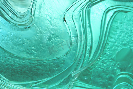 深海蜜柚摄影照片_深海蓝色玻璃纹理背景。
