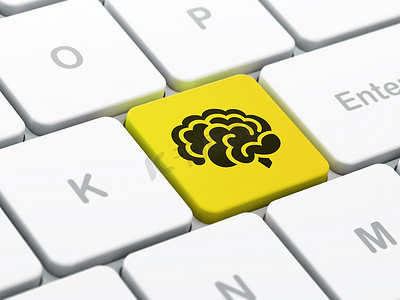 药房摄影照片_科学概念： 计算机键盘背景上的大脑