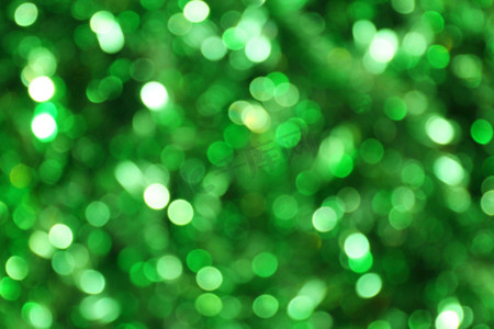 散景绿色效果光抽象闪光背景，圣诞散景绿色背景