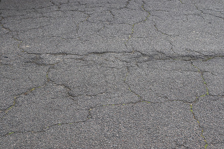 道路沥青摄影照片_不同街道和道路沥青表面的详细视图