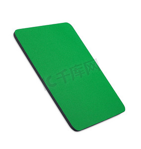 鼠标垫摄影照片_白色背景上的绿色鼠标垫