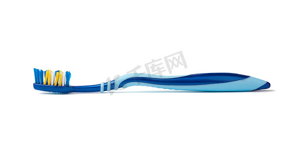 牙刷背景摄影照片_清洁口腔的蓝色塑料牙刷