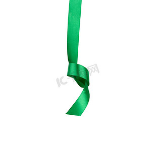 绿色丝带挂在白色上，打结隔离