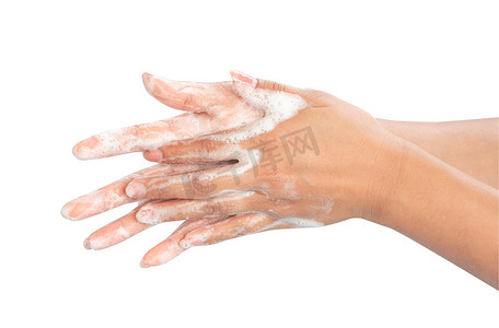 特写女人的手在白色背景上用肥皂洗手，治愈