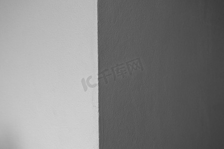 抽象的光影摄影照片_混凝土墙体纹理背景上的抽象光影，f