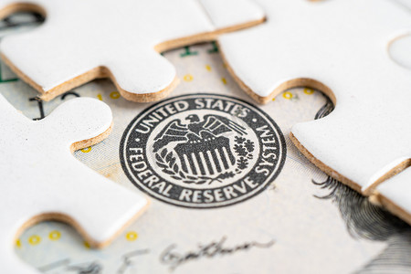 美国危机摄影照片_FED 带有拼图纸的联邦储备系统，美利坚合众国的中央银行系统。