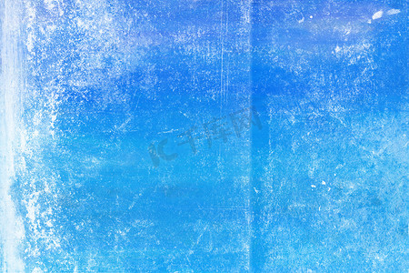 具有纹理表面的背景蓝色石膏墙
