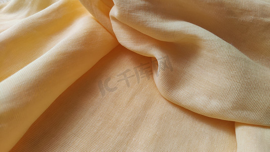 黄色亚麻织物的抽象背景和纹理，由亚麻纤维和周围框架制成