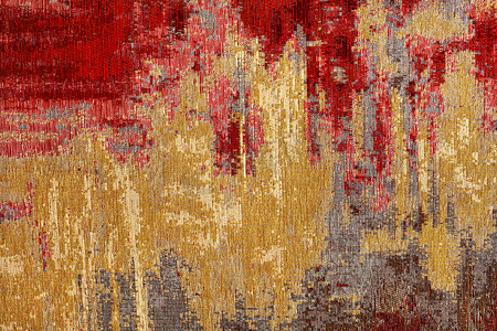 东方风格的抽象红色和金色纺织地毯图案。