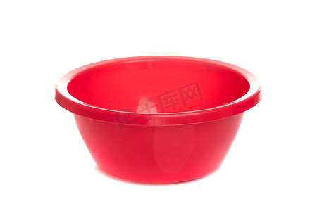白色隔离背景上的空塑料红碗