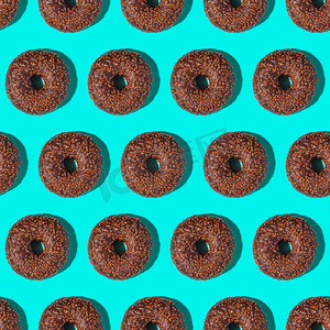 巧克力棕色甜甜圈，洒上，无缝图案
