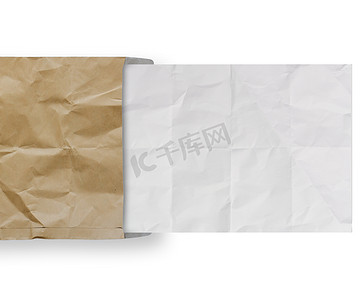 信封折叠摄影照片_从回收信封背景弄皱的纸