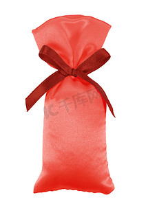礼品小摄影照片_带蝴蝶结的礼品丝绸小袋-红色和红色