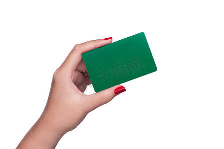 空白卡片摄影照片_拿着空白的绿卡的女性手隔绝在白色背景。