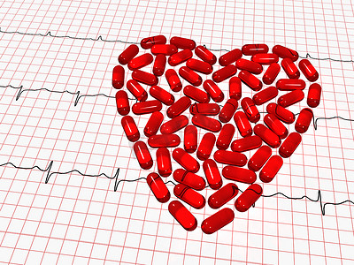 心电图纸和红色药片心脏
