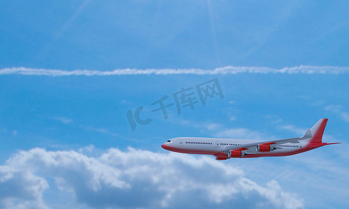 客机白色红色条纹在天空中飞行。
