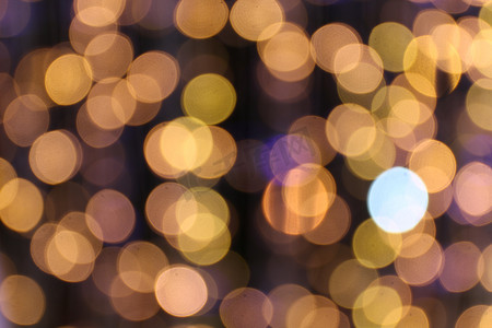 散景背景金黄色五颜六色的圣诞快乐，新年快乐散景灯光照耀在夜间背景，散景闪光灯，金色豪华背景纹理，闪闪发光的壁纸