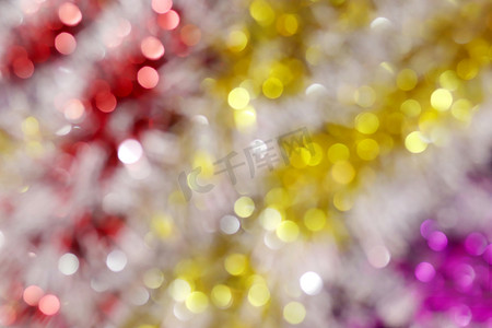 模糊的图片黄色金色散景五颜六色闪闪发光的圣诞快乐和新年快乐节日背景设计
