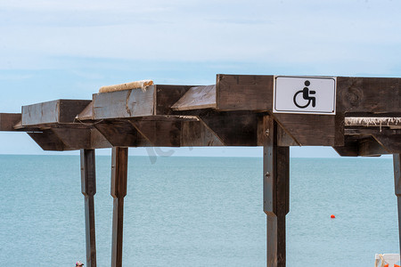 海滩海残疾残疾人标志轮椅残疾人夏季保留，来自瑞典热带轮、度假村海洋的符号障碍。
