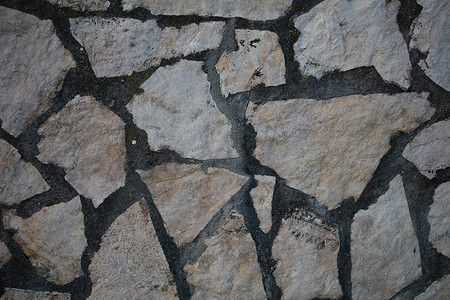 工程设计摄影照片_废弃的卡斯特里希腊村庄复古背景中带岩石的二十年墙高品质大尺寸印刷品