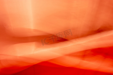 抽象，波浪和褶皱交织，红橙色背景。