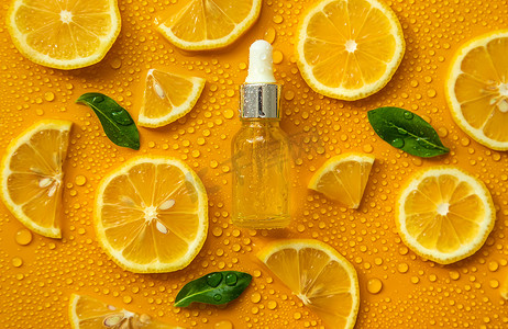 瓶化妆品和液体滴，保湿柠檬。