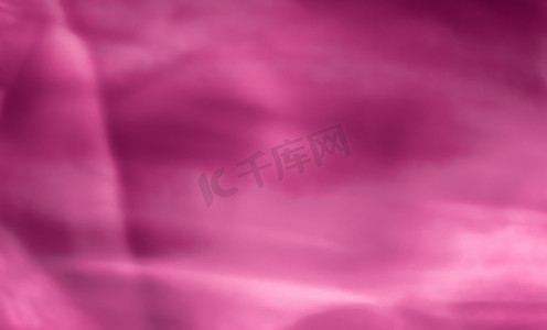 质感背景粉色摄影照片_粉色抽象艺术背景、丝绸质感和运动波浪线，适合经典奢华设计