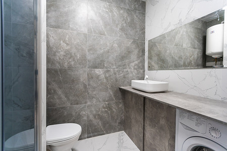 浴缸背景摄影照片_有灰色瓦片的现代卫生间，无缝，豪华内部背景。