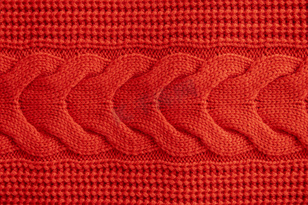 红色针织冬季毛衣背景，红色纹理