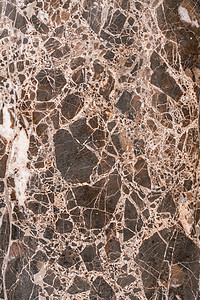 浅色大理石摄影照片_奢华的深棕色大理石，带有浅色条纹。