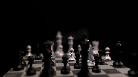 喜迎二十大胜利召开摄影照片_深色背景上的国际象棋棋子。