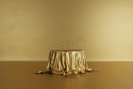 金色背景广告摄影照片_金色产品舞台讲台，金色背景上有豪华面料。