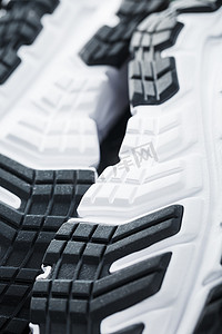 潮流生活摄影照片_潮流运动鞋的黑白鞋底是全屏特写。