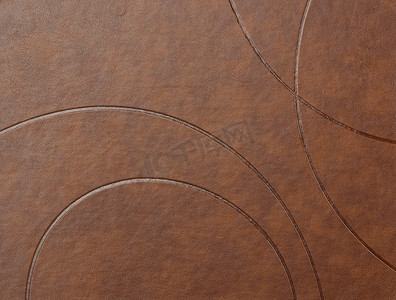 棕色皮革表面的纹理与浮雕元素，全 fr