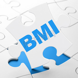 健康指数摄影照片_医疗保健概念： 拼图背景下的 BMI
