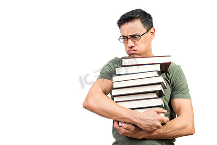 疲惫的男学生背着一摞书