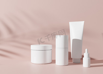 粉红色背景中的一组白色和空白、无品牌的化妆品奶油罐和管子。