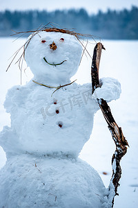 冬天手工雪人摄影照片_一个雪人的肖像，细节很好