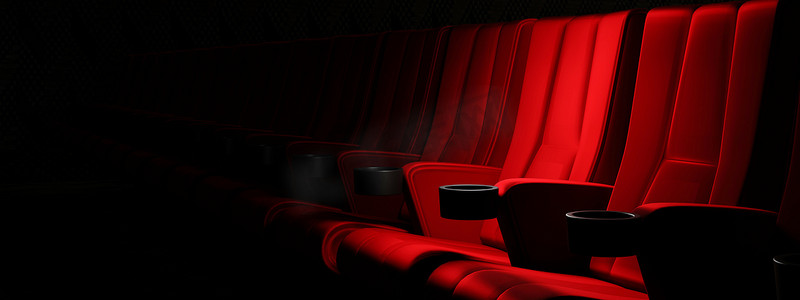 看电影摄影照片_一排排红色天鹅绒座椅在电影院看电影，带有复制空间横幅背景。