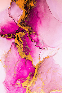 水墨金摄影照片_纸上大理石液体水墨艺术画的粉红金抽象背景。