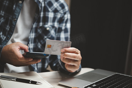 电子商务支付摄影照片_信用卡支付网上购物技术业务数字银行和电子商务概念。