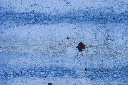 从蓝色旧围栏墙的抽象背景。