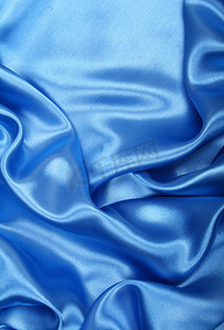 作为背景的光滑优雅的蓝色丝绸