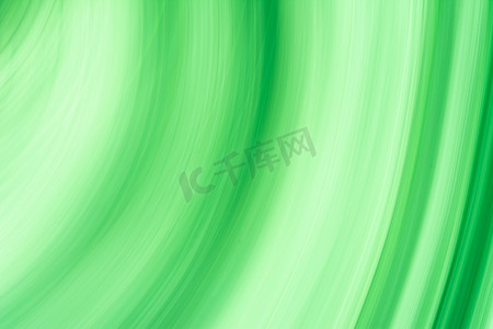 背景抽象、波浪和细弧以绿色色调显示。