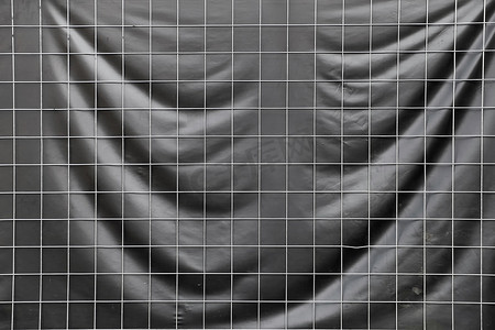 黑方格子背景摄影照片_作为背景的抽象黑方格的纹理