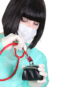 评估诊断摄影照片_护士在钱包上使用听诊器