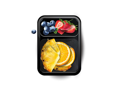 饭盒便当摄影照片_午餐盒里有草莓、蓝莓、橙子和菠萝。